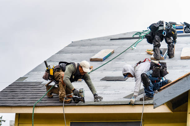 Professional Gutter Installation technician working in Montezuma, NY